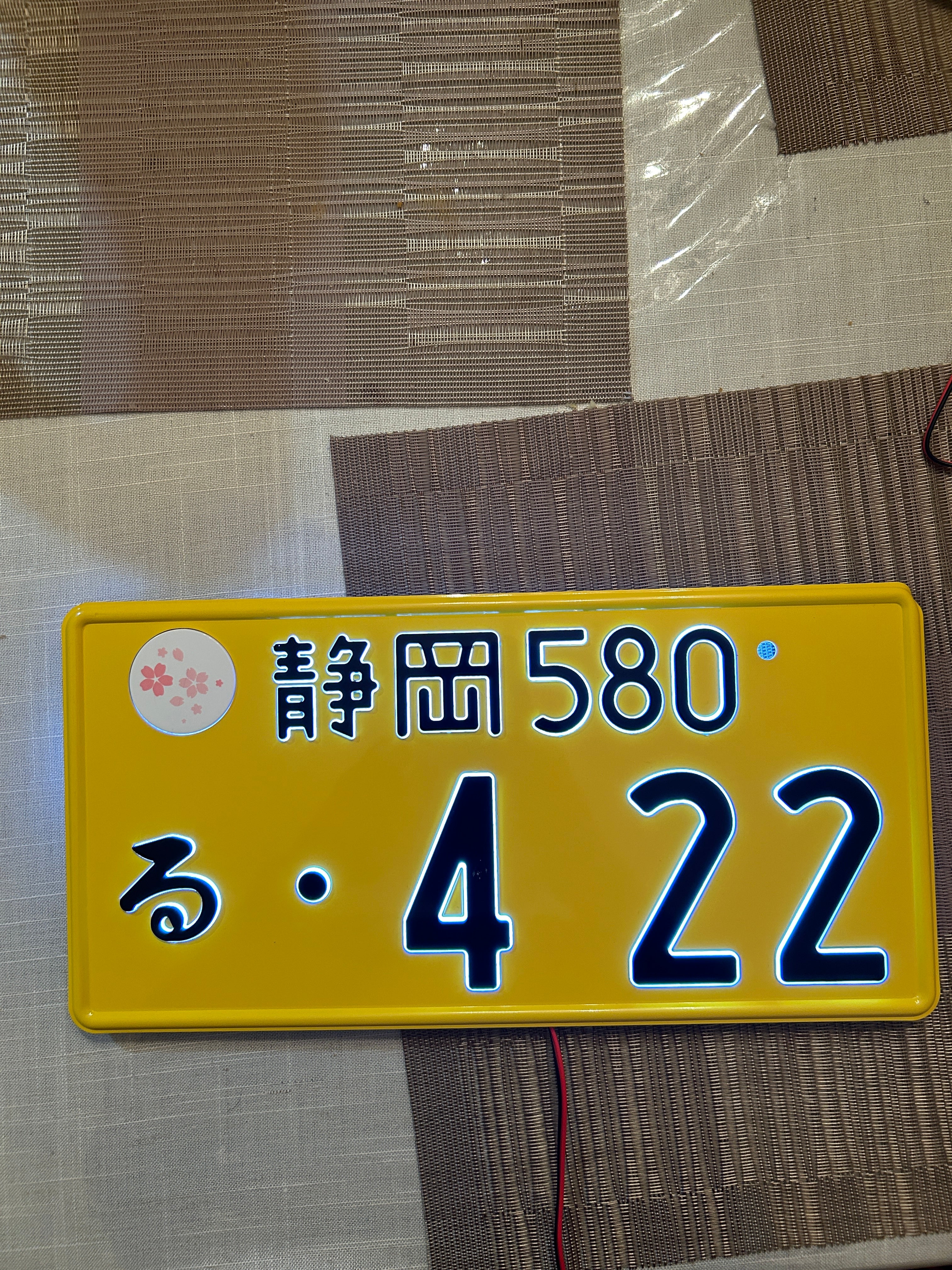 Kei Glow 4-22 License Plate