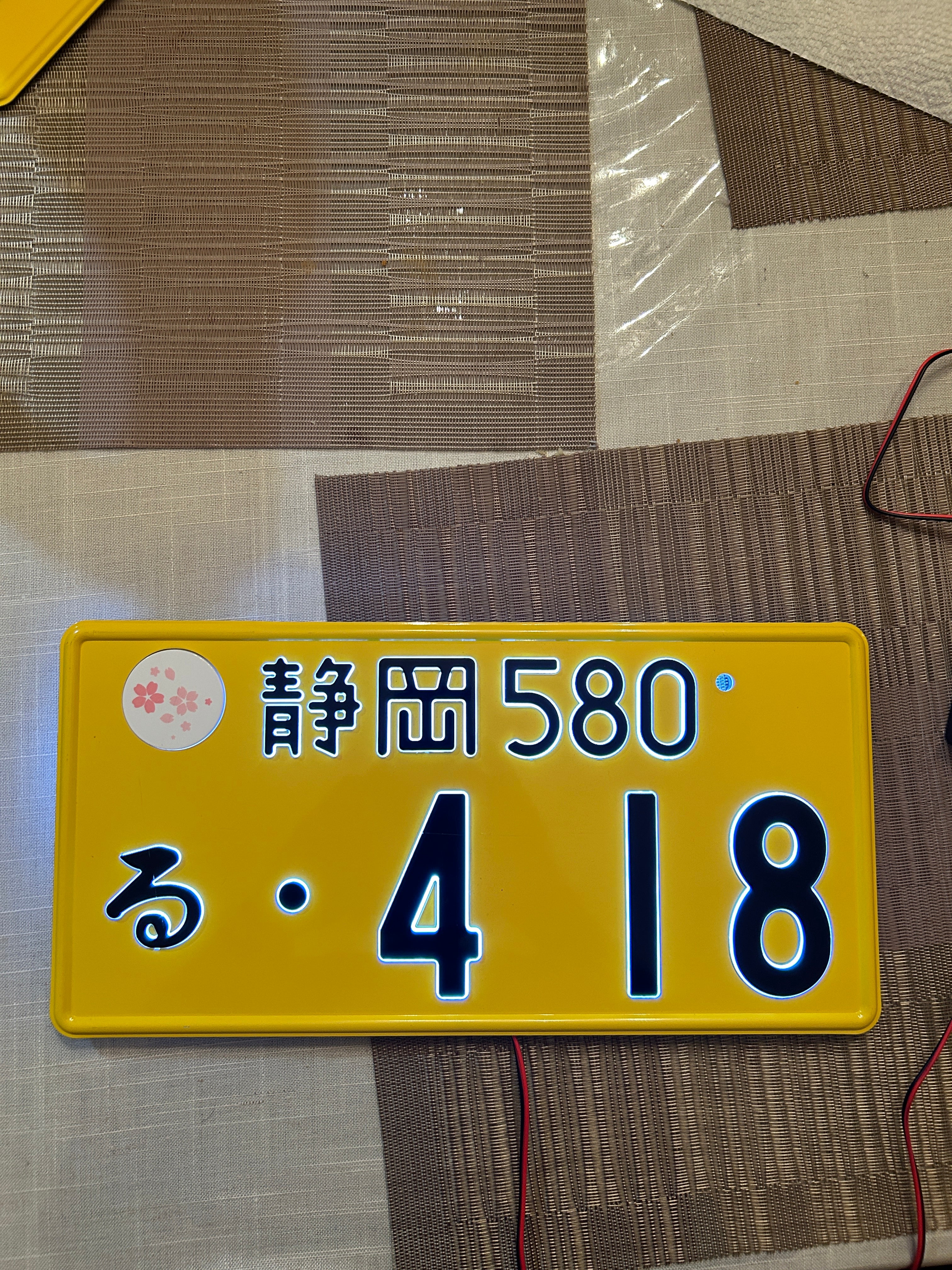 Kei Glow 4-18 License Plate